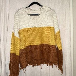 Distressed knit sweater
